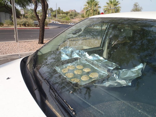 cookies and pizza baking in a car