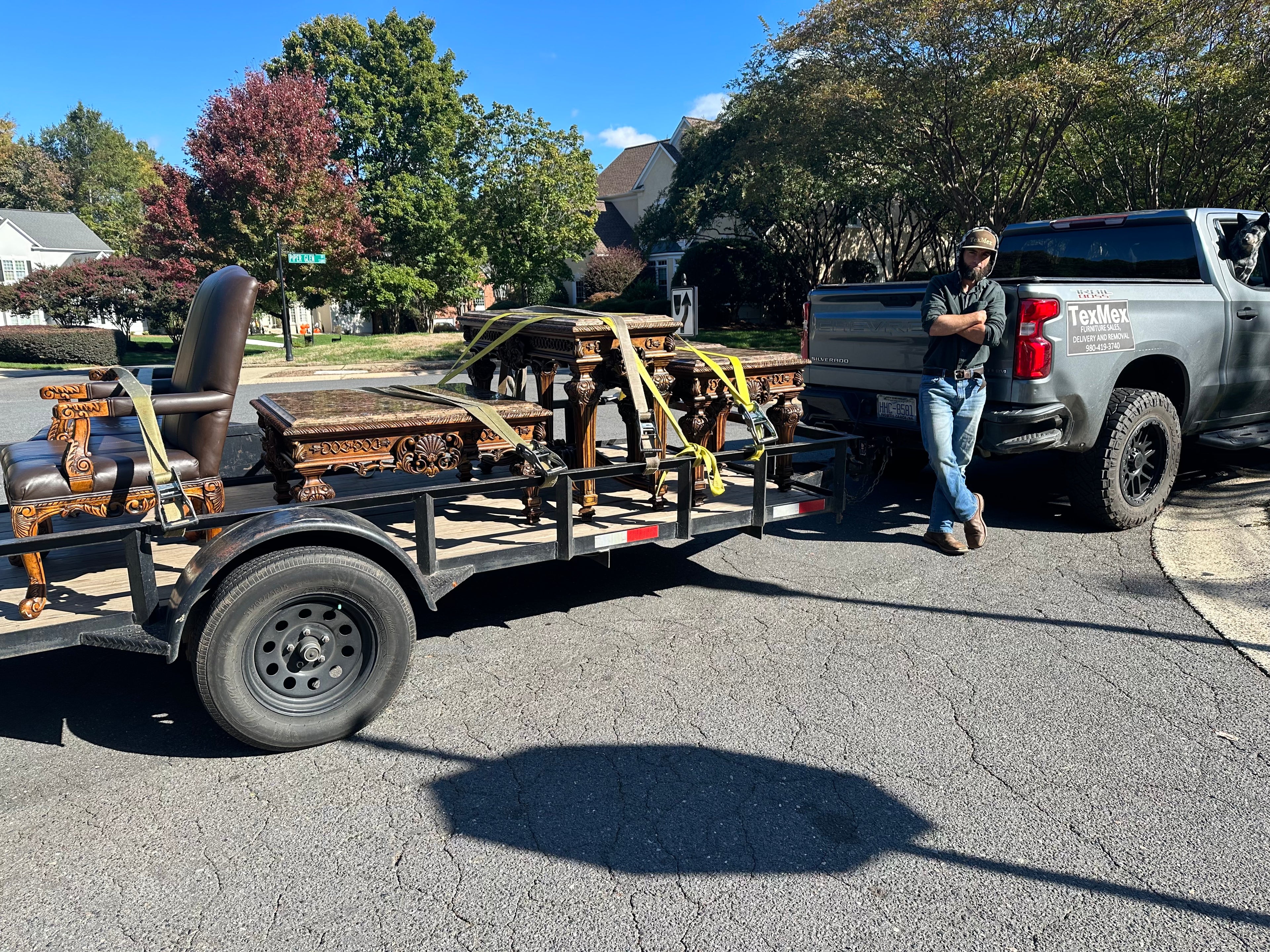 Owner of Charlotte NC based Small Business Free Furniture Removal Service TexMex Furniture Standing next to his Work Truck